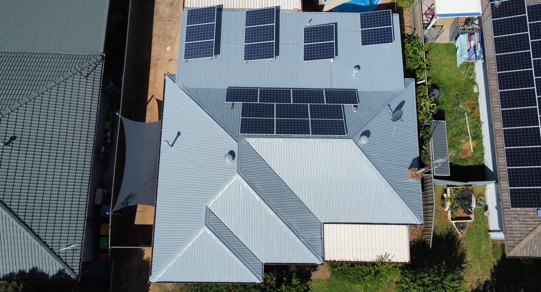 Aerial view of a metal roof coated a clean grey