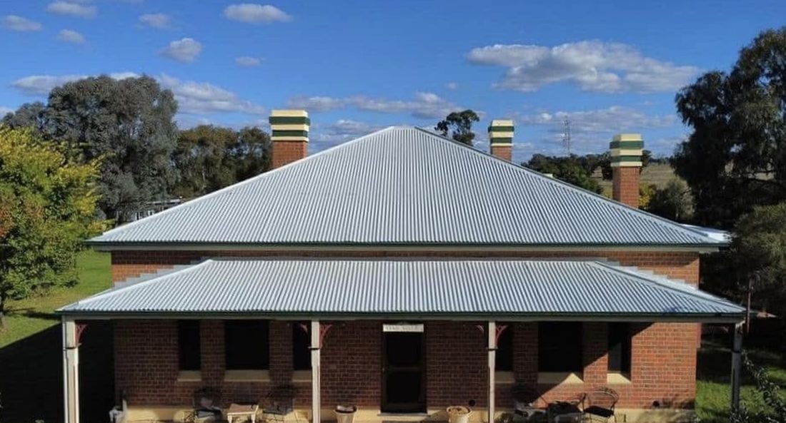 Heritage homestead roof restored to a clean silver finish