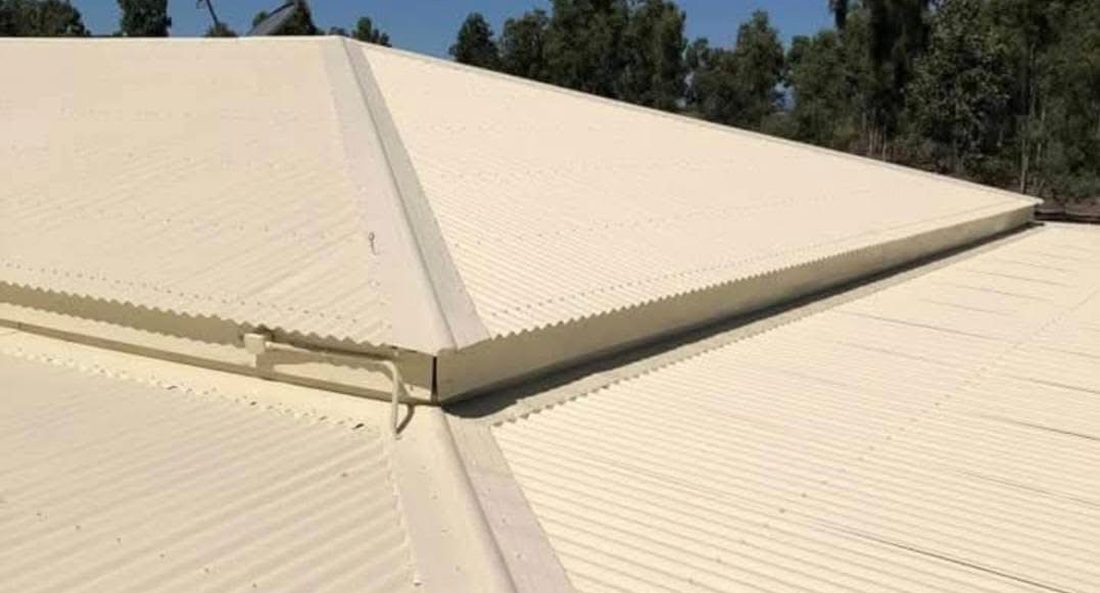 Roof recoated in a clean even tan