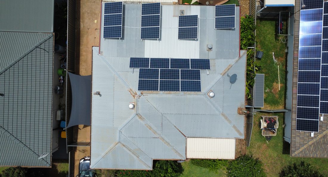 Aerial view of a tired metal roof before coating