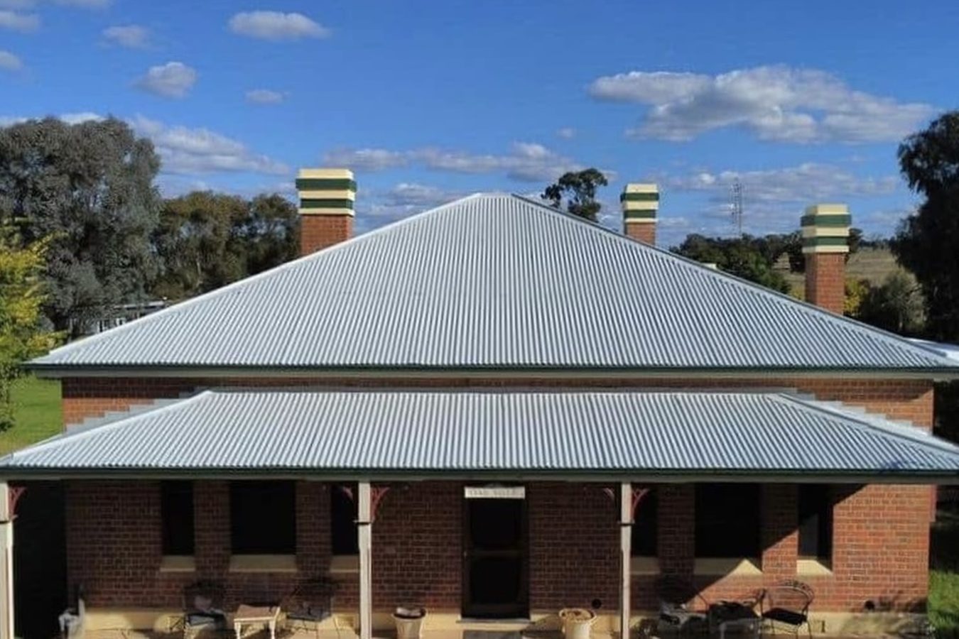 Heritage homestead with a restored silver roof